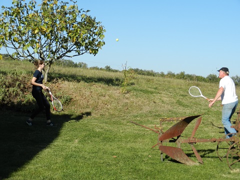 Capucine playing tennis with Joerg